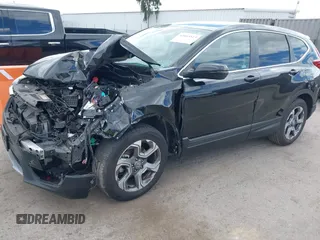 2019 Honda CR-V EX with VIN 5J6RW1H56KA030445, listed as a IAAI auction lot 42043513 with 137,087 mi miles. Bid and sale history available at carsss.com. Image 2.