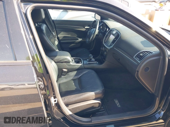 2013 Chrysler 300 with VIN 2C3CCAAGXDH660851, listed as a IAAI auction lot 41970721 with 112,017 mi miles and . Bid and sale history available at carsss.com. Image 5.