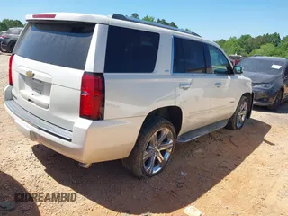 2015 Chevrolet Tahoe LTZ z VIN 1GNSKCKC7FR115444, wystawiony jako IAAI lot #42113903 z przebiegiem 162 383 mil mil oraz . Historia ofert i sprzedaży dostępna na DreamBid. Obrazek 4.