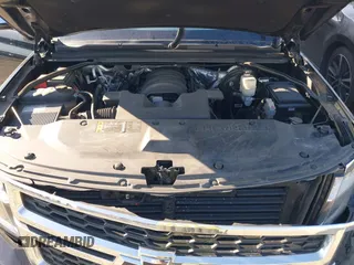 2018 Chevrolet Suburban LT with VIN 1GNSKHKCXJR268938, listed as a IAAI auction lot 41672886 with 76,844 mi miles and . Bid and sale history available at DreamBid. Image 10.