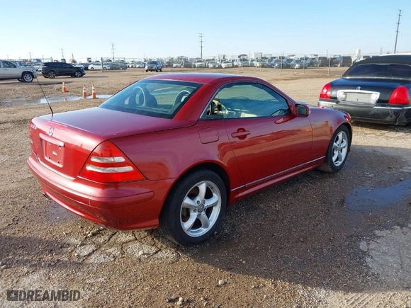 2001 Mercedes-Benz SLK-Class with VIN WDBKK65F71F188015, listed as a IAAI auction lot 40844432 with 115,156 mi miles. Bid and sale history available at carsss.com. Image 4.