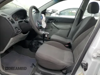2006 Ford Focus S with VIN 1FAFP34N06W105551, listed as a Copart auction lot 52355575 with 176,617 mi miles and Salvage Title. Bid and sale history available at carsss.com. Image 7.