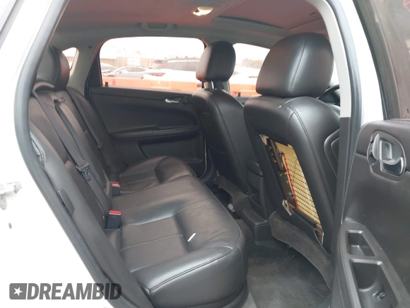 2013 Chevrolet Impala LTZ with VIN 2G1WC5E34D1152402, listed as a IAAI auction lot 41838035 with 214,088 mi miles and . Bid and sale history available at DreamBid. Image 8.