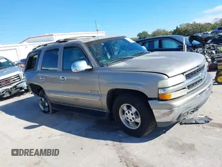 2001 Chevrolet Tahoe LS z VIN 1GNEC13T21J303213, wystawiony jako IAAI lot #41363563 z przebiegiem 194 243 mil mil oraz . Historia ofert i sprzedaży dostępna na DreamBid. Obrazek 13.