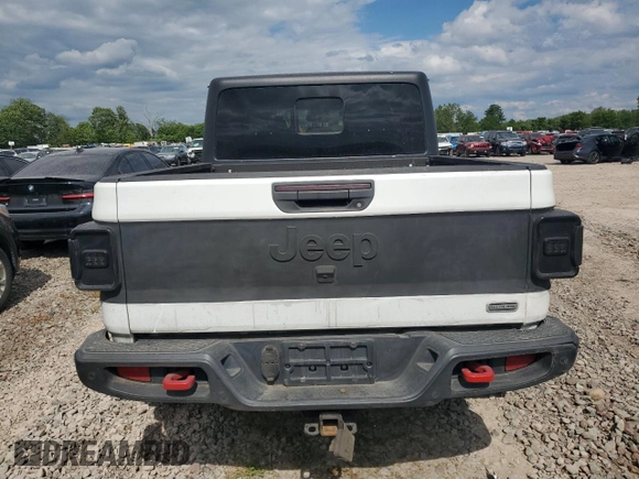 2020 Jeep Gladiator Overland z VIN 1C6HJTFG6LL135872, wystawiony jako Copart lot #59249895 z przebiegiem 113 519 mil mil oraz Czysty tytuł • Clean title. Historia ofert i sprzedaży dostępna na DreamBid. Obrazek 6.
