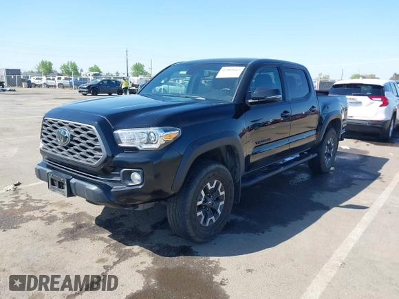 2021 Toyota Tacoma SR z VIN 3TMCZ5AN3MM421868, wystawiony jako IAAI lot #42003665 z przebiegiem 39 380 mil mil oraz . Historia ofert i sprzedaży dostępna na DreamBid. Obrazek 17.