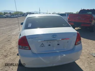 2009 Kia Spectra EX with VIN KNAFE222695588022, listed as a IAAI auction lot 42106609 with 153,688 mi miles. Bid and sale history available at carsss.com. Image 16.