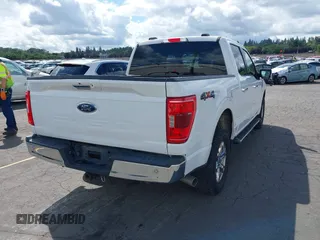 2021 Ford F-150 XL with VIN 1FTFW1E56MFA73752, listed as a IAAI auction lot 42267561 with 86,438 mi miles and . Bid and sale history available at DreamBid. Image 4.