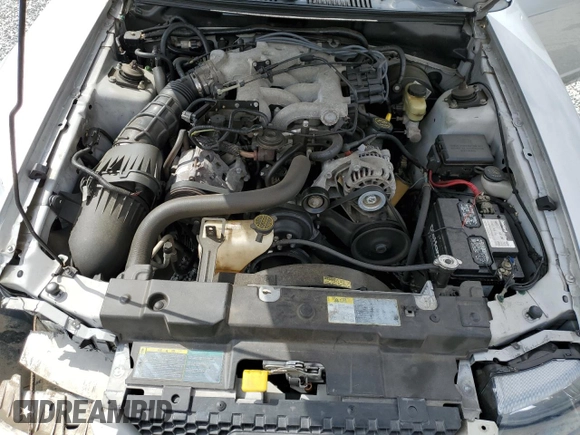 2004 Ford Mustang Standard with VIN 1FAFP40634F181055, listed as a Copart auction lot 49679795 with 187,166 mi miles and Salvage Title. Bid and sale history available at carsss.com. Image 12.