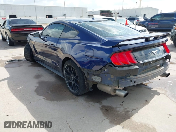 2018 Ford Mustang EcoBoost z VIN 1FA6P8TH0J5104312, wystawiony jako IAAI lot #42532806 z przebiegiem 87 564 mil mil oraz . Historia ofert i sprzedaży dostępna na DreamBid. Obrazek 3.