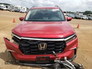 2025 Honda Pilot Touring with VIN 5FNYG2H77SB001016, listed as a Copart auction lot 69767934 with 485 mi miles and Salvage Title. Bid and sale history available at carsss.com. Image 5.