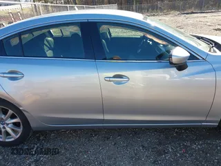 2016 Mazda 6 i Sport with VIN JM1GJ1U50G1412026, listed as a IAAI auction lot 41820838 with 130,262 mi miles and . Bid and sale history available at DreamBid. Image 13.