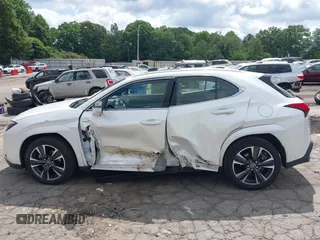 2022 Lexus UX 200 z VIN JTHP3JBH8N2055563, wystawiony jako IAAI lot #42462891 z przebiegiem 25 828 mil mil oraz . Historia ofert i sprzedaży dostępna na DreamBid. Obrazek 14.