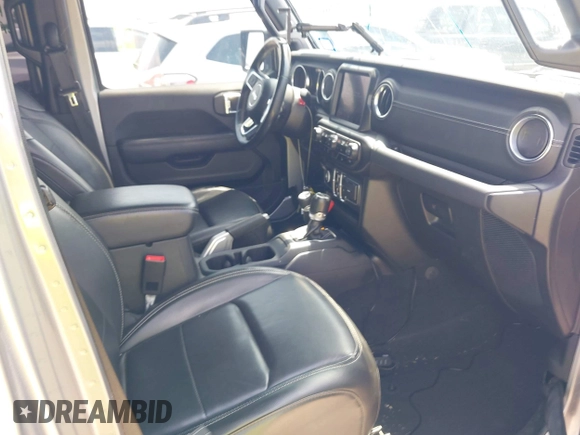 2021 Jeep Wrangler Unlimited High Altitude with VIN 1C4HJXEG3MW511185, listed as a IAAI auction lot 42125883 with 45,564 mi miles and . Bid and sale history available at DreamBid. Image 5.