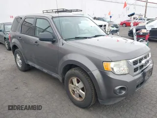 2011 Ford Escape XLS with VIN 1FMCU9C78BKB35289, listed as a IAAI auction lot 42117290 with 221,088 mi miles and . Bid and sale history available at DreamBid. Image 1.