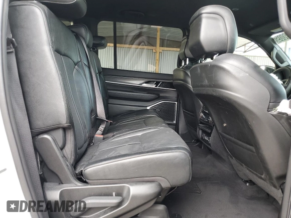 2023 Jeep Wagoneer Series II with VIN 1C4SJSBPXPS529935, listed as a Copart auction lot 42969005 with 34,453 mi miles and Clean title. Bid and sale history available at DreamBid. Image 11.