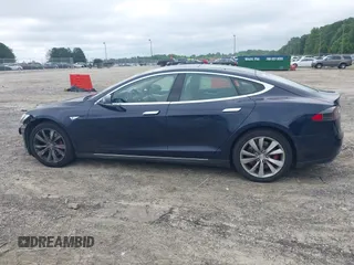 2014 Tesla Model S 60 z VIN 5YJSA1H17EFP33860, wystawiony jako IAAI lot #42471432 z przebiegiem 142 045 mil mil oraz . Historia ofert i sprzedaży dostępna na DreamBid. Obrazek 15.