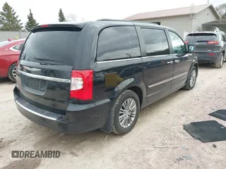 2013 Chrysler Town & Country Touring L with VIN 2C4RC1CG7DR510466, listed as a IAAI auction lot 42180370 with 103,821 mi miles and . Bid and sale history available at DreamBid. Image 4.