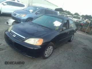 2003 Honda Civic LX with VIN 2HGES16563H602363, listed as a IAAI auction lot 40123995 with 165,413 mi miles. Bid and sale history available at carsss.com. Image 2.