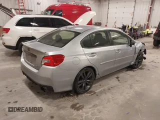 2016 Subaru WRX Premium with VIN JF1VA1E61G9807306, listed as a IAAI auction lot 41853364 with 125,831 mi miles and . Bid and sale history available at DreamBid. Image 4.