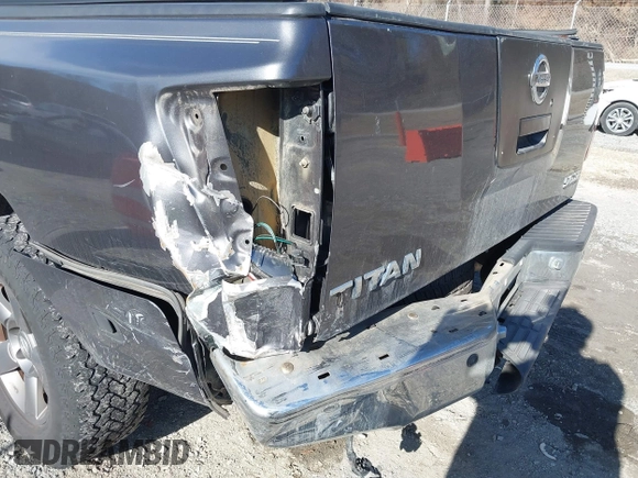 2005 Nissan Titan SE with VIN 1N6BA07B25N532466, listed as a IAAI auction lot 41437704 with 142,762 mi miles and . Bid and sale history available at DreamBid. Image 6.