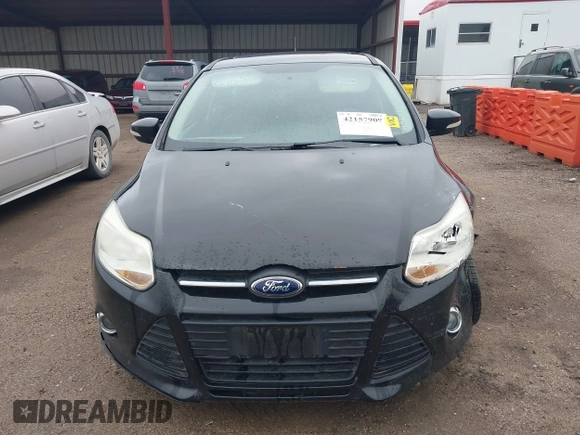 2014 Ford Focus SE z VIN 1FADP3K20EL386198, wystawiony jako IAAI lot #42157909 z przebiegiem 125 097 mil mil oraz . Historia ofert i sprzedaży dostępna na DreamBid. Obrazek 12.