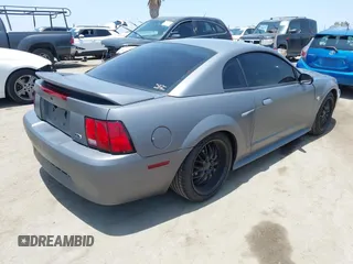 1999 Ford Mustang with VIN 1FAFP4046XF202967, listed as a IAAI auction lot 42574831 with 138,068 mi miles and . Bid and sale history available at DreamBid. Image 4.