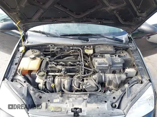 2007 Ford Focus S z VIN 1FAHP34N37W161610, wystawiony jako IAAI lot #42370742 z przebiegiem Nie podano mil oraz . Historia ofert i sprzedaży dostępna na DreamBid. Obrazek 10.