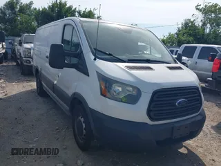 2016 Ford Transit Cargo with VIN 1FTYE1ZM0GKB06687, listed as a IAAI auction lot 42232871 with 330,423 mi miles and . Bid and sale history available at DreamBid. Image 1.