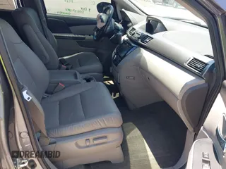 2014 Honda Odyssey EX-L z VIN 5FNRL5H69EB095297, wystawiony jako IAAI lot #42299438 z przebiegiem 126 841 mil mil oraz . Historia ofert i sprzedaży dostępna na DreamBid. Obrazek 5.