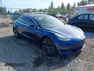 2020 Tesla Model 3 Long Range z VIN 5YJ3E1EB9LF800400, wystawiony jako IAAI lot #42438843 z przebiegiem 92 124 mil mil oraz . Historia ofert i sprzedaży dostępna na DreamBid. Obrazek 1.