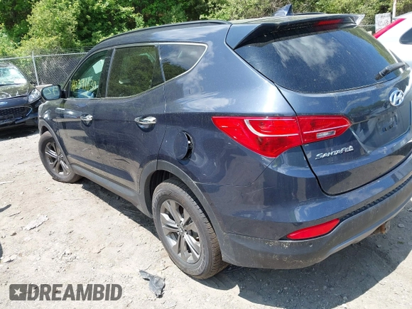 2014 Hyundai Santa Fe with VIN 5XYZUDLB6EG218980, listed as a IAAI auction lot 42391630 with 136,710 mi miles and . Bid and sale history available at DreamBid. Image 3.