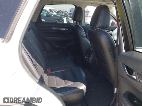 2018 Mazda CX-5 Grand Touring with VIN JM3KFADM8J0373368, listed as a IAAI auction lot 42013535 with 63,142 mi miles and . Bid and sale history available at DreamBid. Image 8.