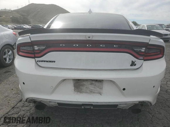 2019 Dodge Charger Scat Pack with VIN 2C3CDXGJ5KH647005, listed as a Copart auction lot 47257945 with 69,245 mi miles and Salvage Title. Bid and sale history available at DreamBid. Image 6.