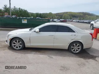 2014 Cadillac ATS Luxury RWD z VIN 1G6AB5RX6E0130600, wystawiony jako IAAI lot #42094510 z przebiegiem 122 872 mil mil oraz . Historia ofert i sprzedaży dostępna na DreamBid. Obrazek 14.