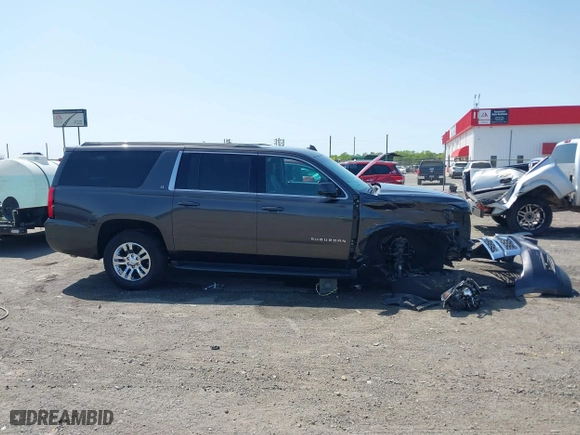 2018 Chevrolet Suburban LT with VIN 1GNSCHKCXJR128787, listed as a IAAI auction lot 41909965 with 123,020 mi miles. Bid and sale history available at carsss.com. Image 13.