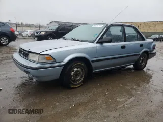 1991 Toyota Corolla z VIN JT2AE94A3M3461395, wystawiony jako Copart lot #44276345 z przebiegiem 49 578 mil mil oraz Szkoda całkowita • Salvage title. Historia ofert i sprzedaży dostępna na DreamBid. Obrazek 1.