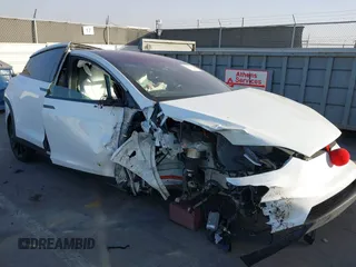 2017 Tesla Model X 90D z VIN 5YJXCAE20HF041506, wystawiony jako IAAI lot #41246836 z przebiegiem Nie podano mil oraz . Historia ofert i sprzedaży dostępna na DreamBid. Obrazek 1.