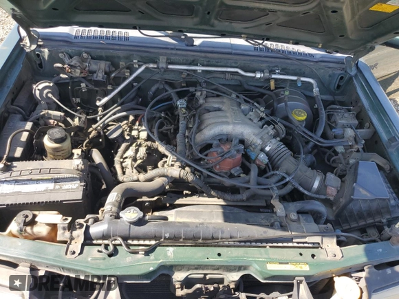 2000 Nissan Frontier XE with VIN 1N6ED27T0YC364061, listed as a Copart auction lot 61863515 with 226,867 mi miles and Clean title. Bid and sale history available at DreamBid. Image 11.