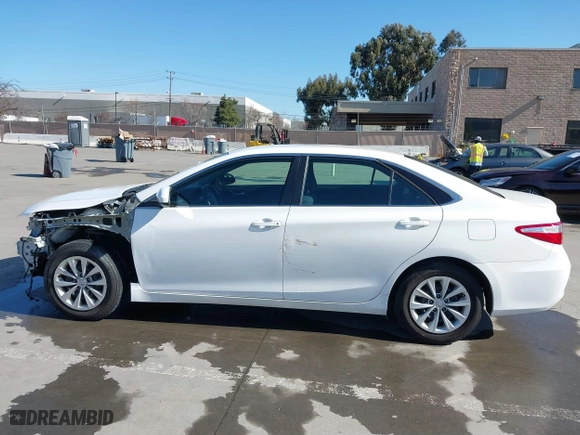 2015 Toyota Camry Hybrid LE with VIN 4T1BD1FK9FU155428, listed as a IAAI auction lot 41666063 with 154,608 mi miles. Bid and sale history available at carsss.com. Image 15.