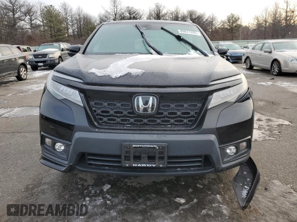 2021 Honda Passport Touring with VIN 5FNYF8H96MB007268, listed as a Copart auction lot 89077285 with 63,232 mi miles and Salvage Title. Bid and sale history available at carsss.com. Image 5.