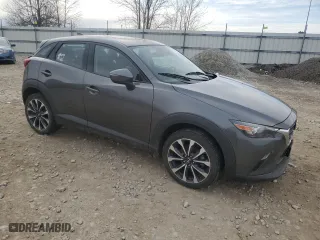 2019 Mazda CX-3 Touring with VIN JM1DKFC7XK0425624, listed as a Copart auction lot 48925815 with 63,563 mi miles and Non Repairable. Bid and sale history available at carsss.com. Image 4.