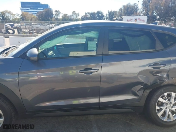 2021 Hyundai Tucson SE with VIN KM8J23A45MU355712, listed as a IAAI auction lot 41702731 with 71,196 mi miles. Bid and sale history available at carsss.com. Image 14.