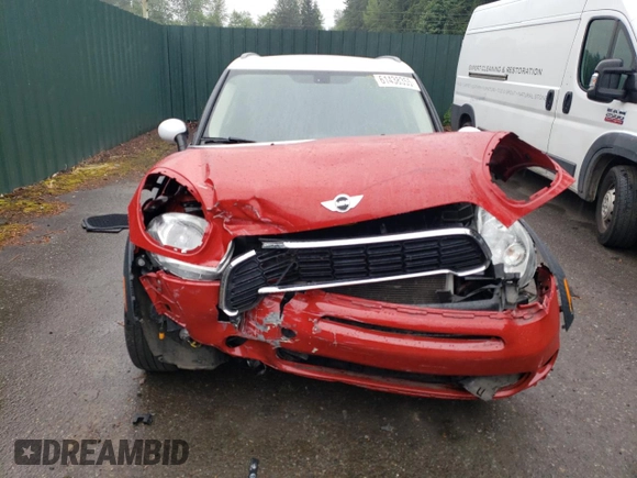 2014 MINI Countryman S with VIN WMWZC3C52EWP25379, listed as a Copart auction lot 61438355 with 76,943 mi miles and Salvage title. Bid and sale history available at DreamBid. Image 5.