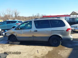 2003 Toyota Sienna LE with VIN 4T3ZF13C03U524122, listed as a IAAI auction lot 41655361 with 216,256 mi miles. Bid and sale history available at carsss.com. Image 14.