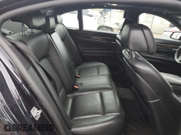 2015 BMW 7 Series 750i xDrive with VIN WBAYB6C56FD965841, listed as a Copart auction lot 48748145 with 102,305 mi miles and Salvage Title. Bid and sale history available at carsss.com. Image 10.