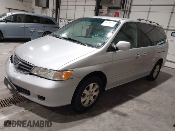 2003 Honda Odyssey EX with VIN 5FNRL18673B009670, listed as a IAAI auction lot 42130172 with 218,391 mi miles and . Bid and sale history available at DreamBid. Image 2.
