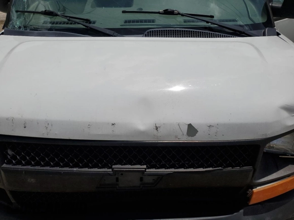 2013 Chevrolet Express Cargo with VIN 1GCWGFBA4D1105381, listed as a Copart auction lot 60138065 with 209,922 mi miles and Salvage title. Bid and sale history available at DreamBid. Image 12.