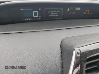 2020 Toyota Prius LE z VIN JTDL9RFU6L3021262, wystawiony jako Copart lot #60809845 z przebiegiem 83 870 mil mil oraz Szkoda całkowita • Salvage title. Historia ofert i sprzedaży dostępna na DreamBid. Obrazek 9.