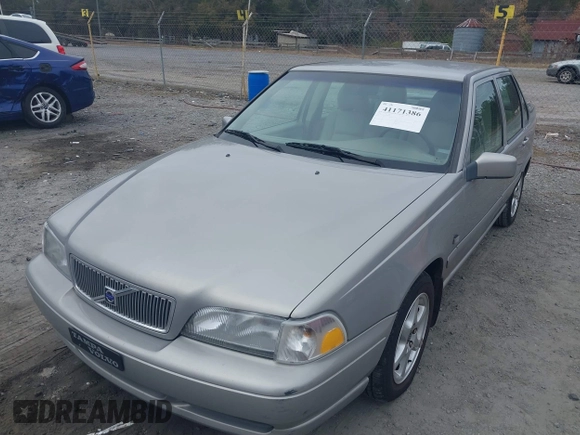 1999 Volvo S70 z VIN YV1LS55AXX1584296, wystawiony jako IAAI lot #41171386 z przebiegiem 163 872 mil mil oraz . Historia ofert i sprzedaży dostępna na DreamBid. Obrazek 6.